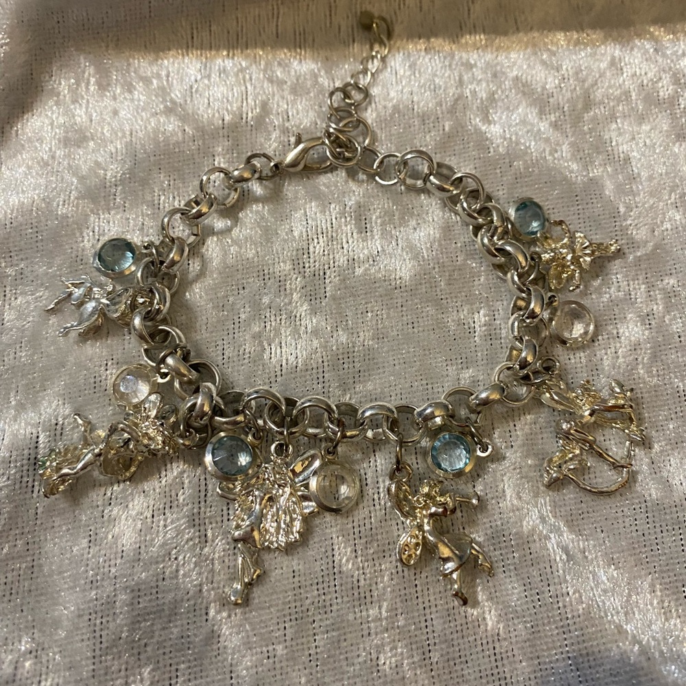 Cherub Silver Charm Bracelet with Light Blue and Clear Stones